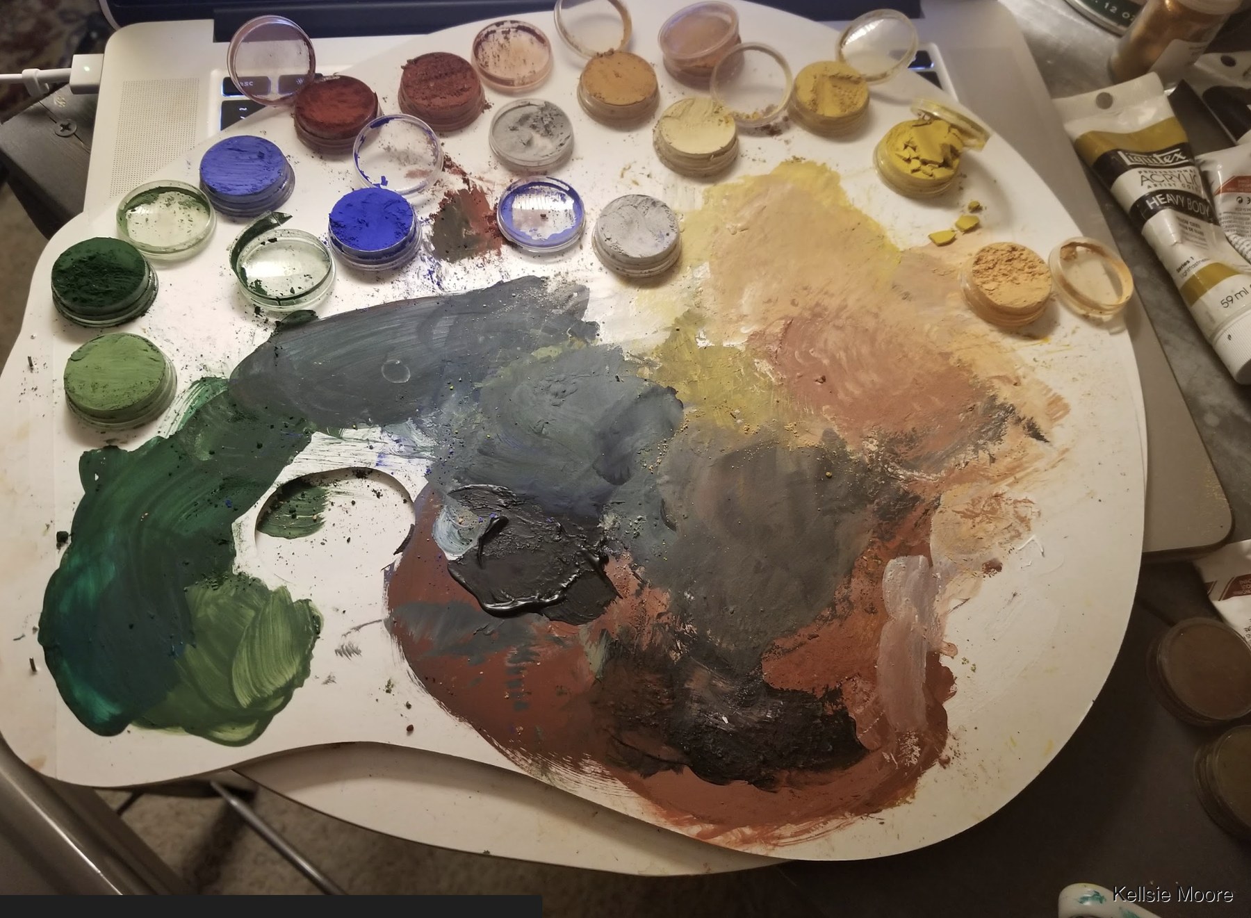 French powder pigments and acrylic paint in Kellsie Moore's studio.